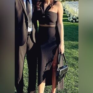 Women’s Abercrombie black set. Symmetrical crisscross top and matching skirt.